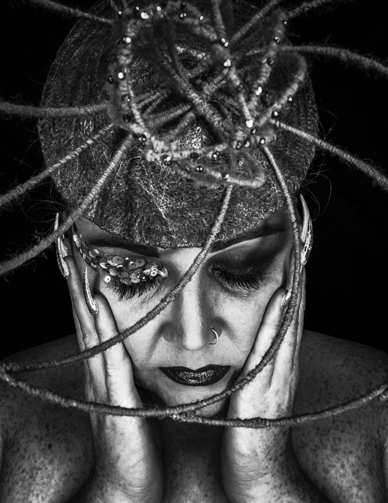 The Warriors Withing Collective - Self Portrait series featuring Sarah O' Rourke wearing Saraden Designs Millinery Pieces