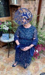 Herdotie Galway Races - Margaret O' Rourke wearing Irish Designer Saraden Designs Millinery Atelier