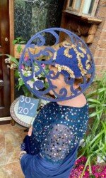 Herdotie Galway Races - Margaret O' Rourke wearing Irish Designer Saraden Designs Millinery Atelier