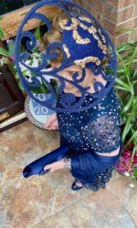 Herdotie Galway Races - Margaret O' Rourke wearing Irish Designer Saraden Designs Millinery Atelier