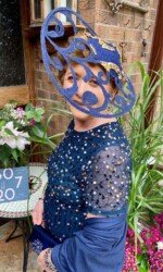 Herdotie Galway Races - Margaret O' Rourke wearing Irish Designer Saraden Designs Millinery Atelier