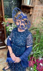 Herdotie Galway Races - Margaret O' Rourke wearing Irish Designer Saraden Designs Millinery Atelier