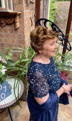 Herdotie Galway Races - Margaret O' Rourke wearing Irish Designer Saraden Designs Millinery Atelier