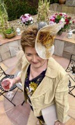 Margaret O' Rourke wearing Saraden Designs Millinery Atelier